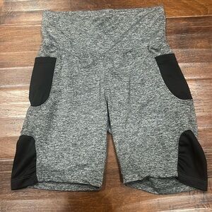 These are Joan Vasa biker shorts in size M in juniors section
